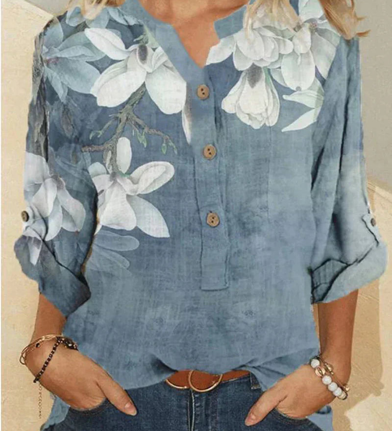 Camisa feminina de gola alta em algodão com bordados florais