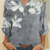 Camisa feminina de gola alta em algodão com bordados florais