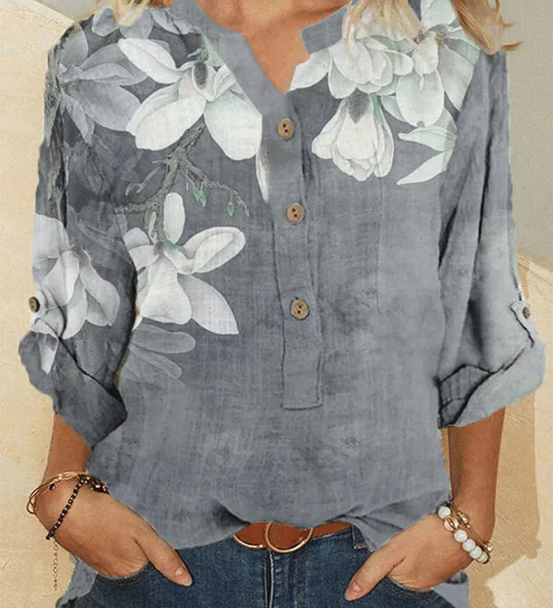 Camisa feminina de gola alta em algodão com bordados florais