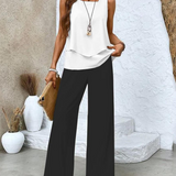 Alba | Conjunto de blusa e calça com estampa floral estilosa
