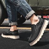 Sapatos de couro elegantes