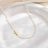 Conjunto com Cruz e Pérolas