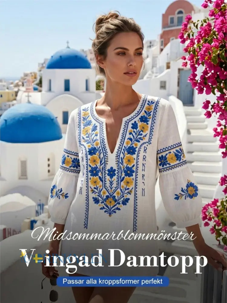 Dams retro artistisk svensk midsommarblommig topp med V-ringning